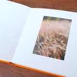 Custom album for professional photography mounted on museum-grade mats